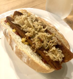 Hot dog with added kraut  at The Very Good Butchers in Victoria