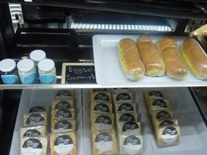 Deli case, vegan cheeses, sandwiches at The Very Good Butchers in Victoria
