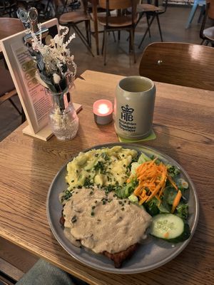 Schnitzel and a beer   at SIGGIS v/gan dine & co. in Munich