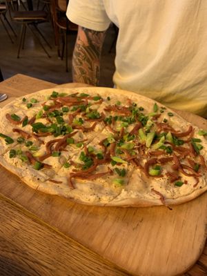 Flammkuchen w/speck  at SIGGIS v/gan dine & co. in Munich