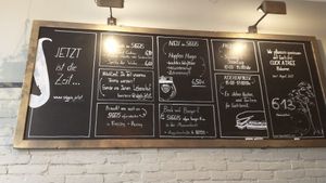 Specials board at SIGGIS v/gan dine & co. in Munich