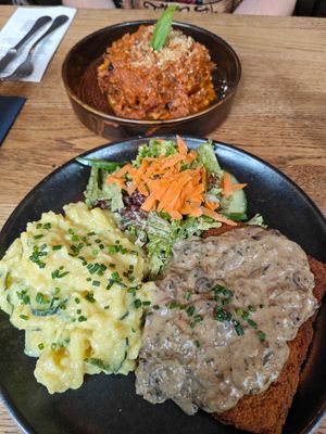 Schnitzel with mushroom sauce and potato salad at SIGGIS v/gan dine & co. in Munich