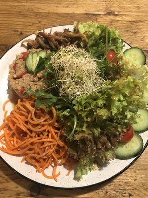 Huge salad with mushrooms at SIGGIS v/gan dine & co. in Munich