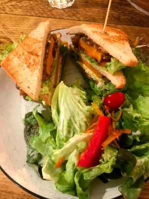 Club sandwich with salad at SIGGIS v/gan dine & co. in Munich
