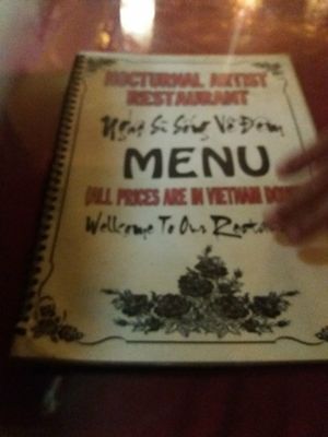 Funky menu at Nocturnal Artist in Hoi An