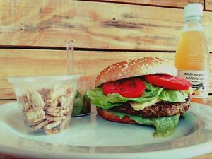 Cheesse Vegan Salada Burguer, Kombucha, banana snacks and green vegan mayonnaise. at Quinoa Real in Sao Paulo