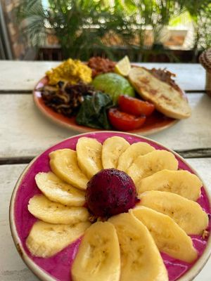 Banana & Dragon fruit bowl. Vegan big breakfast in the background. at SHAKA - Bohol in Panglao