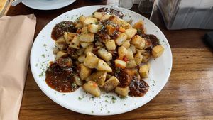Fried potatoes with bbq sauce (although tasty, I do not recommend eating them at 7am)  at Bread and Chocolate in Puerto Viejo De Talamanca
