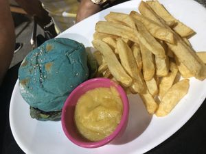 Hamburguesa con patatas y dip de cheddar at Loving Hut - Palermo in Buenos Aires