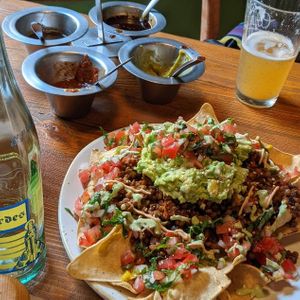 Nachos, kombucha, and delicious salsas at Don Taco Tequila in San Miguel De Allende