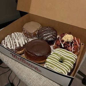 coconut oreo, chocolate cherry, half baked red velvet, guava cheese, orlando cream, matcha blueberry cheesecake at Valkyrie Doughnuts in Orlando