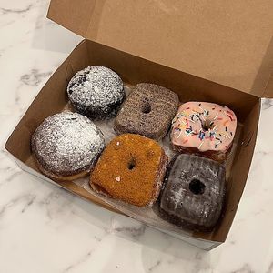 chocolate bavarian cream, blueberry churro, strwaberry sprinkle, strawberry jelly, biscoff , choco-lit at Valkyrie Doughnuts in Orlando