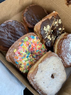 Orlando cream, fruity pebbles, Twix, strawberry filled and French toast at Valkyrie Doughnuts in Orlando