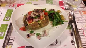 Jacket potato with houmous  at Manchester Vegan Cafe in Manchester
