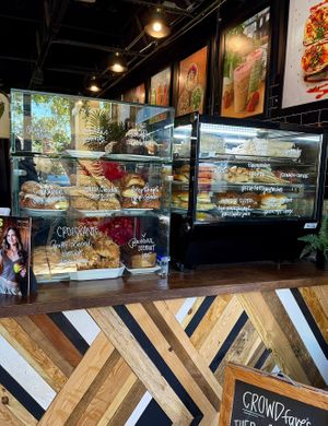 Bakery case - Coconut Banana Loaf labeled vegan at The Seed in Boca Raton
