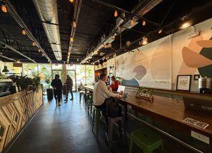 Indoor work space and community tables at The Seed in Boca Raton