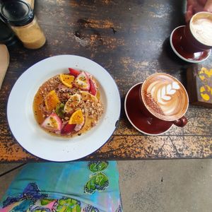 Almond & cashew Capuccino  with cinnamon bagel at Folk in Byron Bay