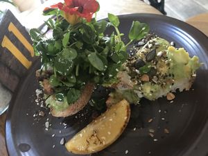 Smashed avo on sourdough. at Folk in Byron Bay