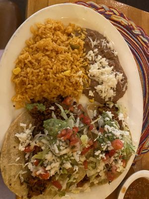 Soy chorizo tacos, refried beans, Spanish rice with vegan cheese  at Hugo's Cocina  in San Diego