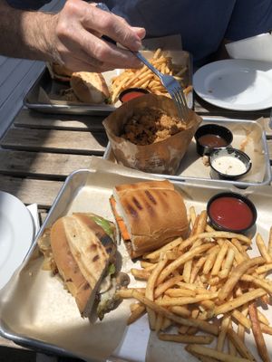 Popcorn chicken with Bahn mi & Philly sandwiches  at Grains  in San Diego
