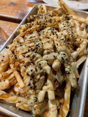 The Tokyo fries and and indulgent treat.  at Grains  in San Diego