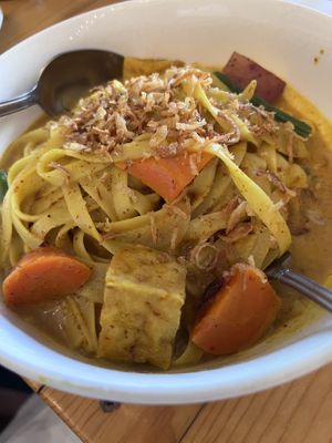 House noodles in curry sauce  at Grains  in San Diego