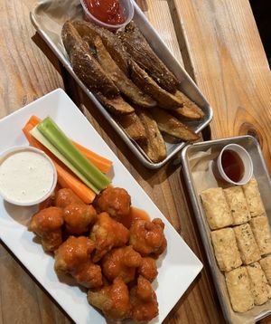 buffalo cauliflower, garlic fries, and tofu nuggets  at Grains  in San Diego