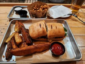 Pulled pork with steak fries at Grains  in San Diego