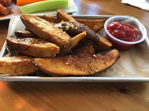 Garlic Potato Wedges at Grains  in San Diego