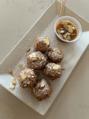 Banana fritters with caramel sauce  at Grains  in San Diego