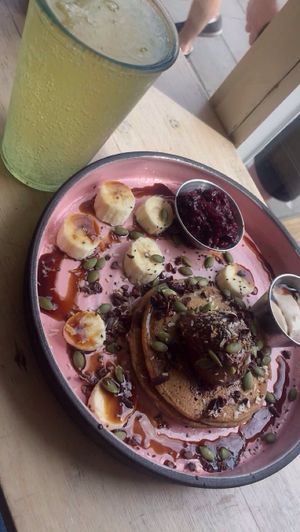 Buckwheat pancakes and kombucha  at The Longhouse Cafe in Brighton