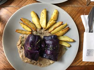 Red cabbage rolls with mushrooms and backed potatoes  at Zjadliwości in Lodz