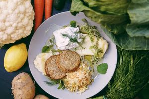 Cauliflower cakes | lemon potato puree | raita | new cabbage salad at Zjadliwości in Lodz