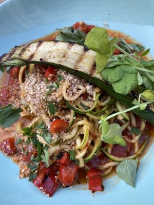 Zucchini pasta with tomato sauce at Zjadliwości in Lodz