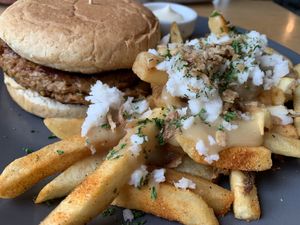 Burger with poutine   at The Botanist in Wellington