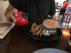 Royal with cheese with a cute ketchup dispenser at The Botanist in Wellington