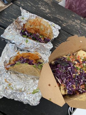 KBBQ taco (top), Birdie Sanders taco, and the Jorge’s beef nachos at The Vegan Nom - E Cesar Chavez  in Austin