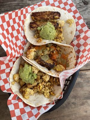 3 different tacos. Micas, Tempeh Bacon & Potato and Tofu  at The Vegan Nom - E Cesar Chavez  in Austin