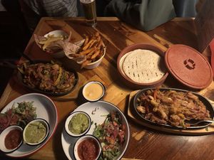 Jackfruit fajita’s with fries   at Smithy's Tavern in Huez