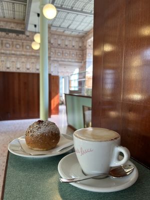 Raspberry jam brioche and soy cappuccino   at Bar Luce in Milan