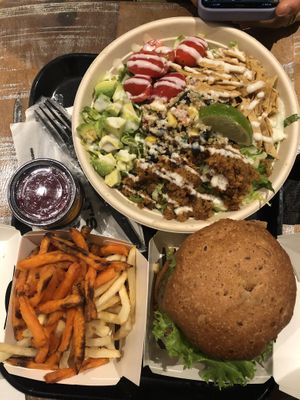 Guac burger and quinoa taco salad at Beatnic - Soho in New York City
