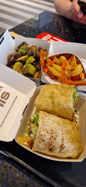 Chicken wrap, 50/50 fries and broccoli at Beatnic - Soho in New York City