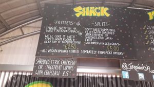 Menu board at Jerk Shack in Manchester