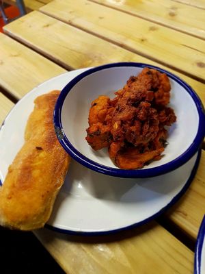 Assortment of fritters and dumpling at Jerk Shack in Manchester