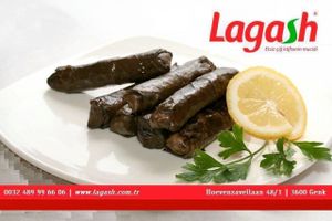 sarma, is a vegan dish made of grape leaves rolled around and filled with spices and rice.
 at Lagash in Genk