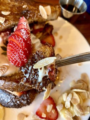 The Nutella type sauce, fruits, cream, toast, and maple syrup of the Stuffed French Toast are yummy   at The Wild Chive in Long Beach