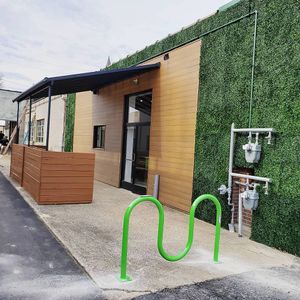 Side Patio with seating and bike rack at Branch Out in Paducah