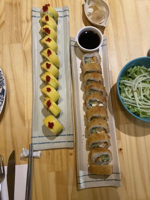 The 2 sushi rolls- really great. The yellow one is the tropical one   at Helecho in Medellin
