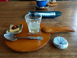 b) appetizer: plum jam and vinegar, dry bread and dry fruit 'salami' at Nyabinghi in Ikoma