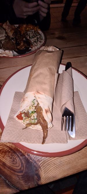 Falafel wrap with zucchini, bulgur, hummus, spicy pesto at The Chickpea in Crete